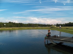 Cody, wetting a line.