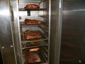 Hams and bacons smoking