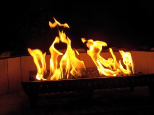 Firelight dancing in the darkness