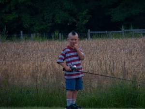 Johnny fishing in the pond